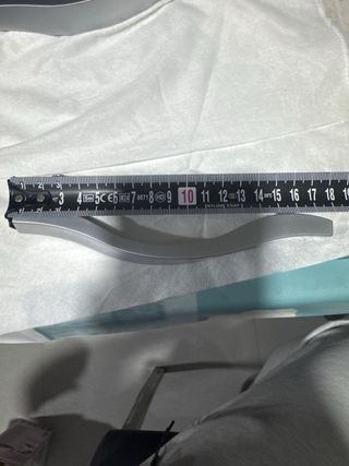 Tirador de mueble curvo