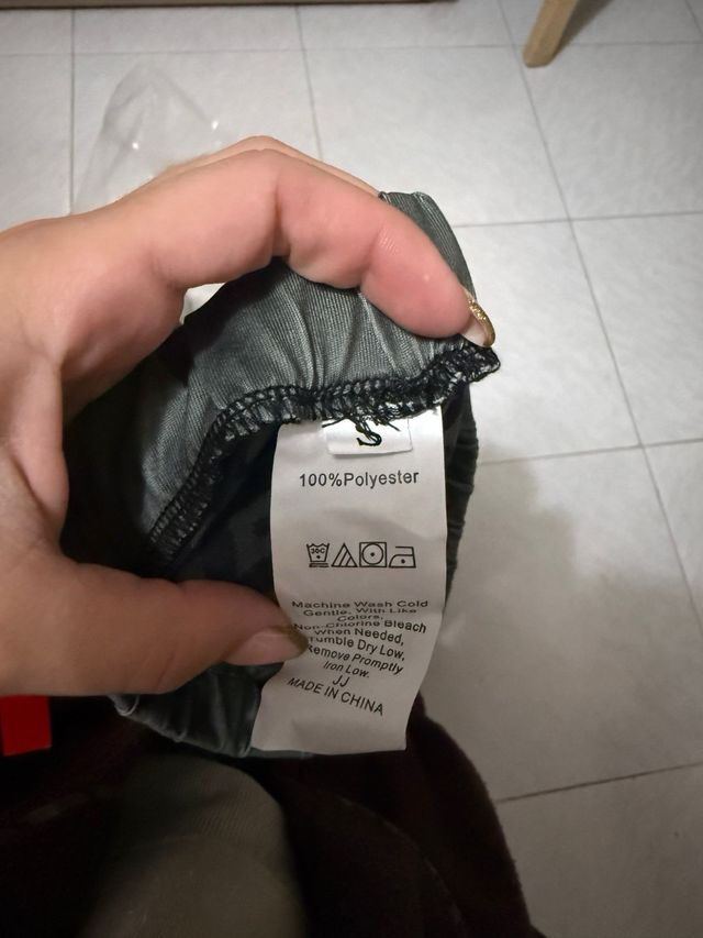 Conjunto deportivo verde y negro