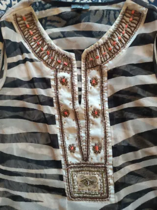 Top sin mangas estampado animal