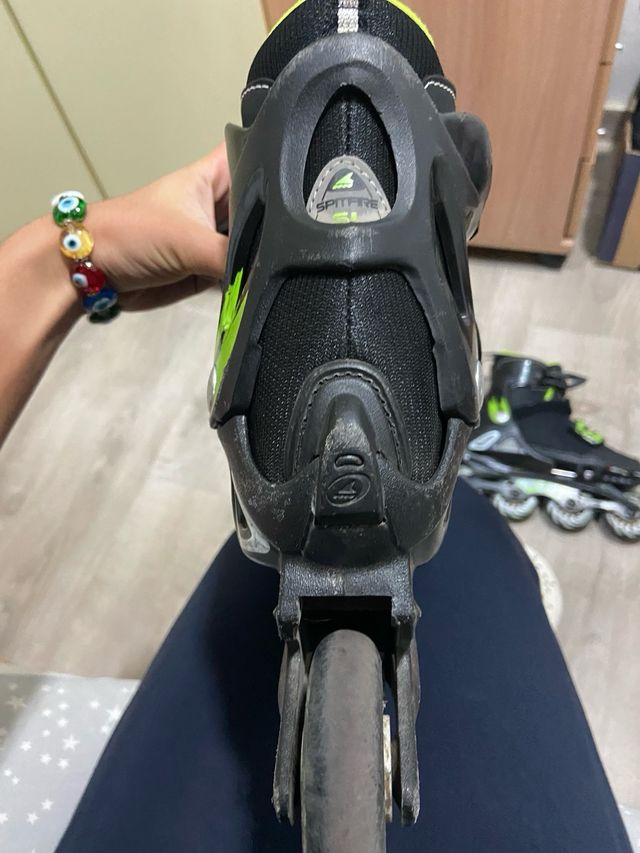 Patines en línea negros y verdes viene con mochila