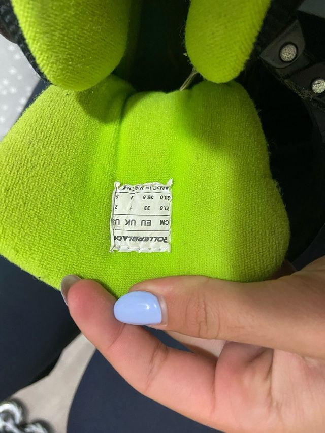 Patines en línea negros y verdes viene con mochila