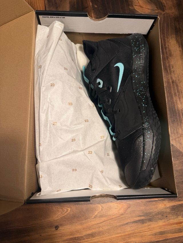 Zapatillas Jordan 1 Low Negras y Turquesa T.47,5