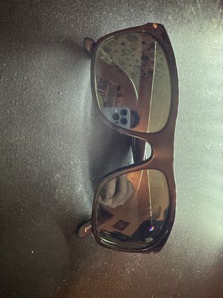 Gafas de sol Persol Negras cristal verdoso.