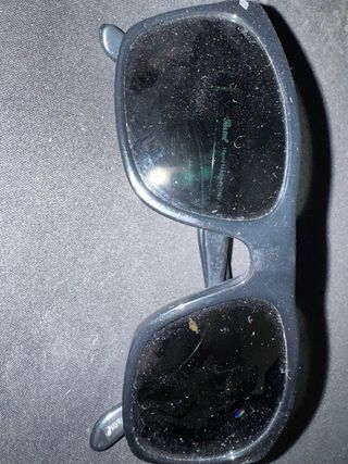 Gafas de sol Persol Negras cristal verdoso.