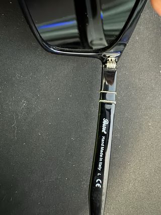 Gafas de sol Persol Negras cristal verdoso.