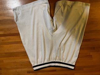Pantalones cortos blancos de malla para hombre