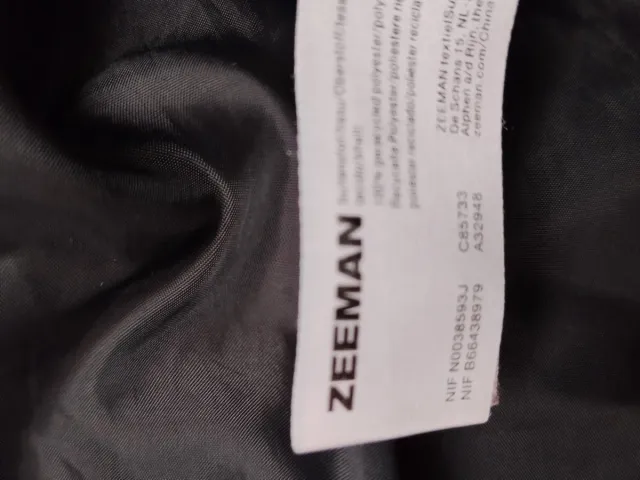 Cazadora niña negra con capucha