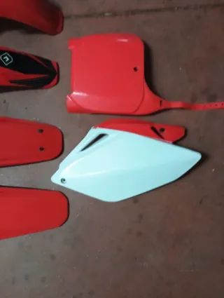 Carenado y guardabarros honda cr rojos