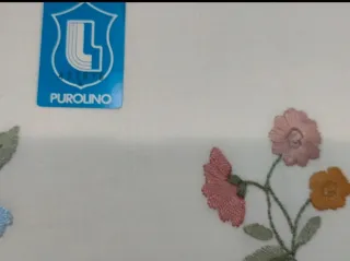 Lenzuola matrimoniali in puro lino ricamate a mano