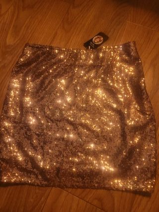 Falda M lentejuelas doradas nueva