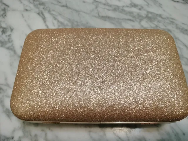 Bolso de fiesta dorado brillante