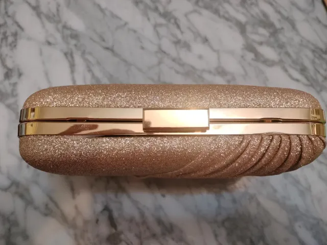 Bolso de fiesta dorado brillante