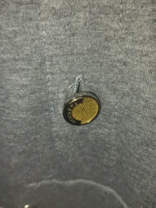 Mono deportivo con capucha gris. Marca Just Succés