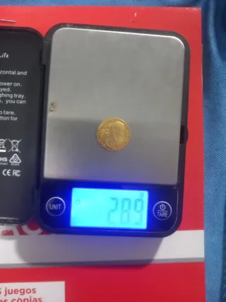 Moneda oro