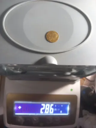 Moneda oro