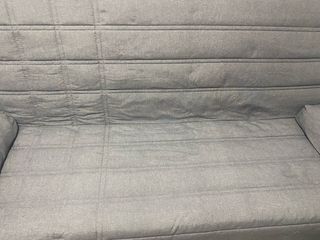Sofá cama gris sin usar
