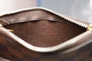 Pochette Louis Vuitton portamonete/chiavi