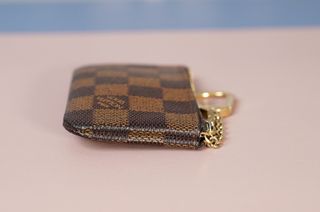 Pochette Louis Vuitton portamonete/chiavi