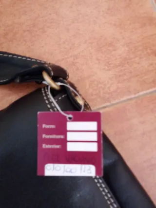 Bolso piel negro sin estrenar con etiqueta