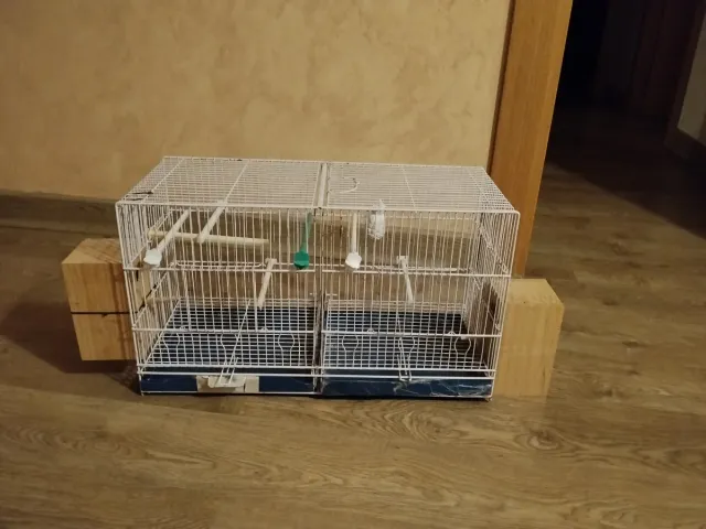 Jaula 60cm + 2 nidos madera