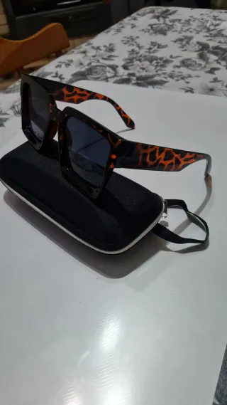 Occhiali da sole donna neri e arancioni