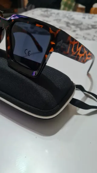 Occhiali da sole donna neri e arancioni