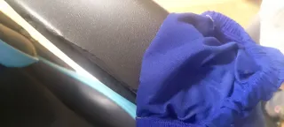 Silla gamer negra y azul.Con signos de desgaste