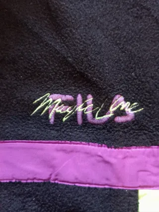 Forro polar Fila negro y morado