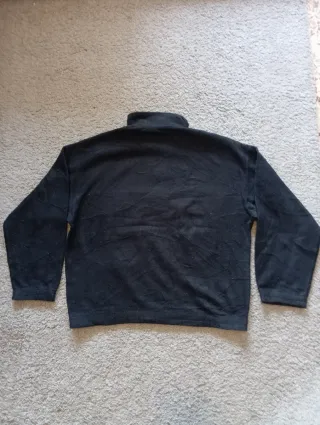 Forro polar Fila negro y morado