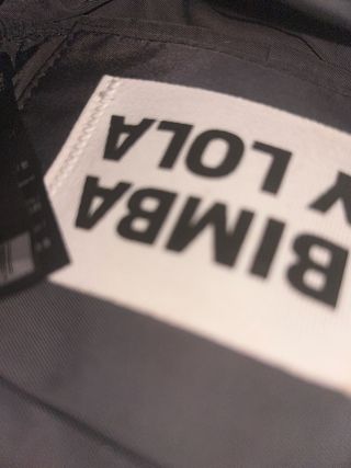 Bolso negro trenzado de piel