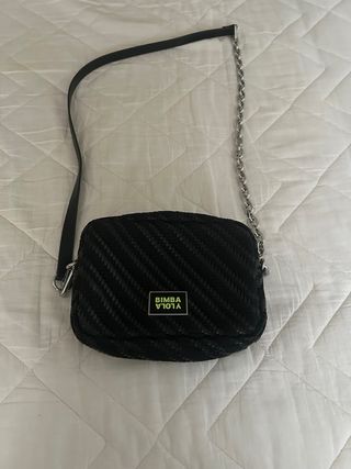 Bolso negro trenzado de piel