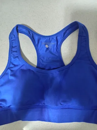 Top deportivo Nike blanco y azul