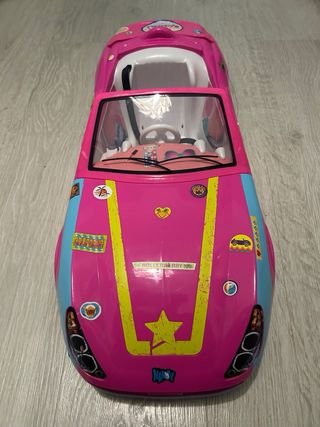 Nancy patinadora con coche rosa