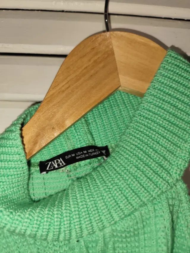 Jersey verde de punto trenzado