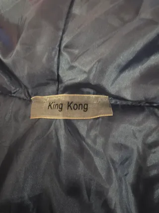 Pellicciotto ecologico blu con cappuccio