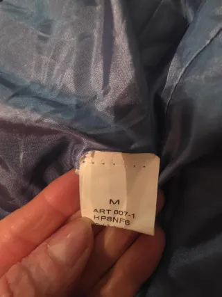 Pellicciotto ecologico blu con cappuccio