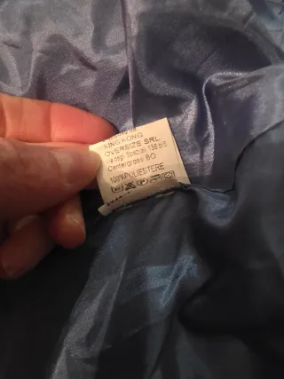 Pellicciotto ecologico blu con cappuccio