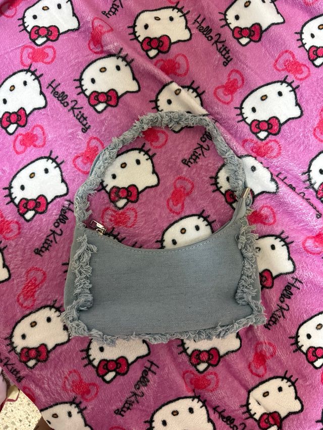 Bolso vaquero desgastado