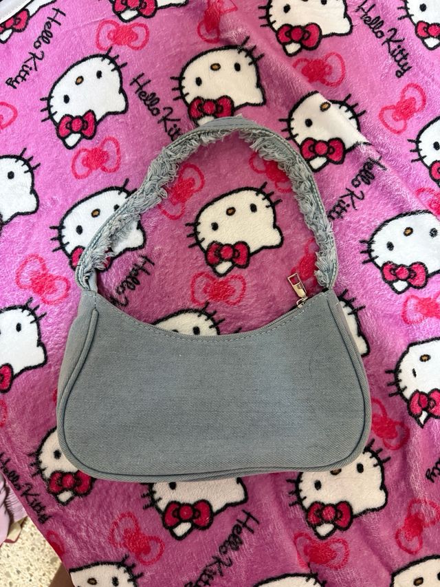 Bolso vaquero desgastado