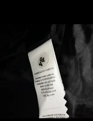 Chaqueta Purificación García Gris y Negra