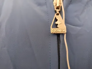 Traje de flamenca azul volantes