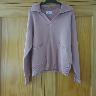 Jersey rosa cuello polo con bolsillos