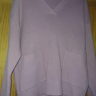 Jersey rosa cuello polo con bolsillos