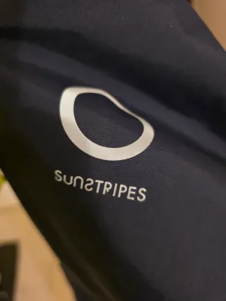 Piumino Sunstripe blu con cappuccio