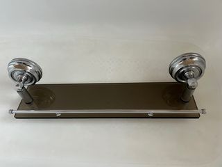 Estante de baño de vidrio y metal