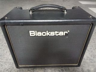 Guitarra Epiphone Les Paul Standard y ampli HT5