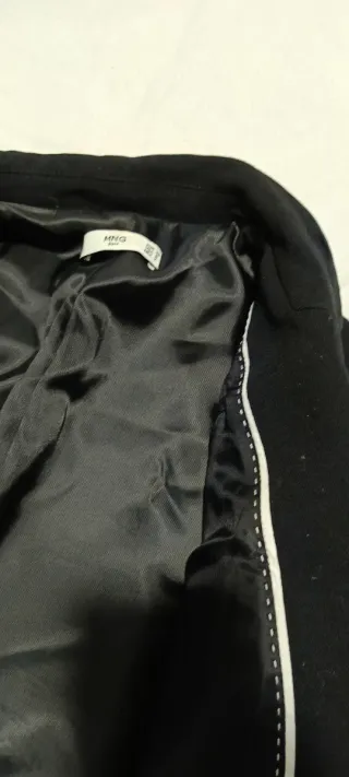 Americana elegante mujer color negro.