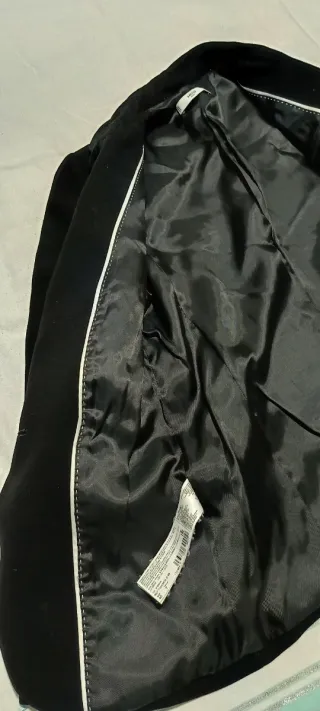 Americana elegante mujer color negro.