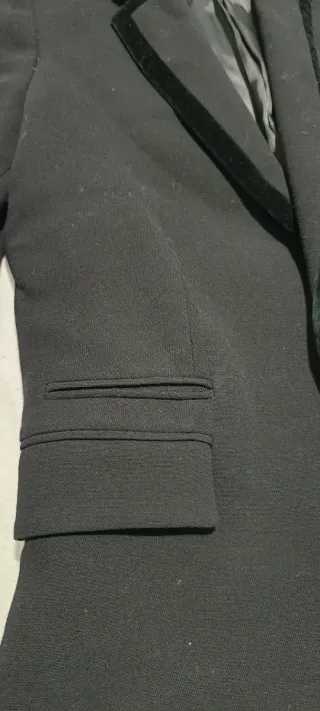 Americana elegante mujer color negro.