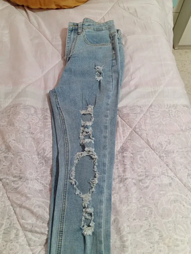 Vaqueros rotos azules